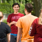 student leads a college tour